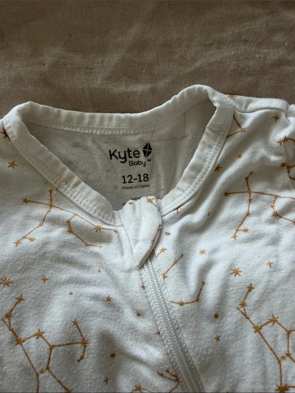 Kyte BABY Cream Constellation Zip Footie with Gold Print
